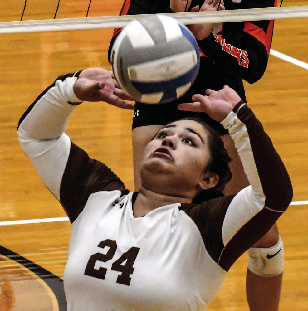Buffaloes dominate home volleyball quad with three wins Garden City