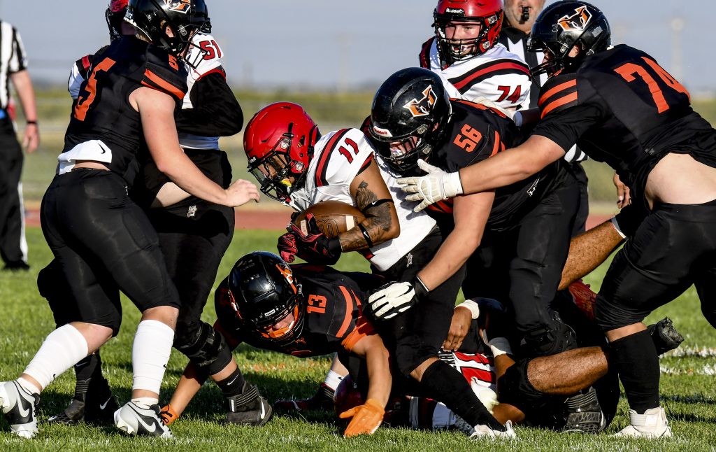 Football games begin for high school teams Garden City Telegram